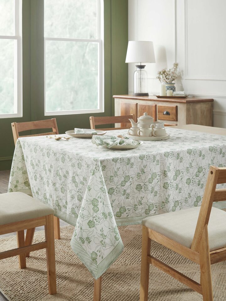Top-down shot highlighting the full table cover spread on a 4-seater table with detailed floral motifs