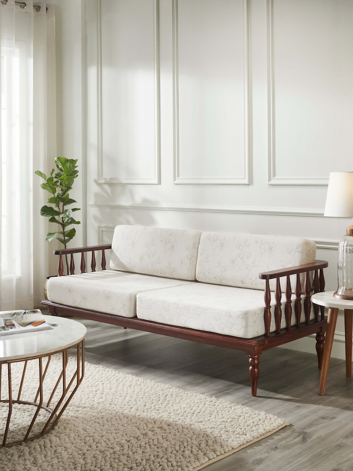 Side view of Teak Finish Upholstered Sheesham Wood 3-seater Sofa, showcasing its stylish teak finish and plush upholstery.