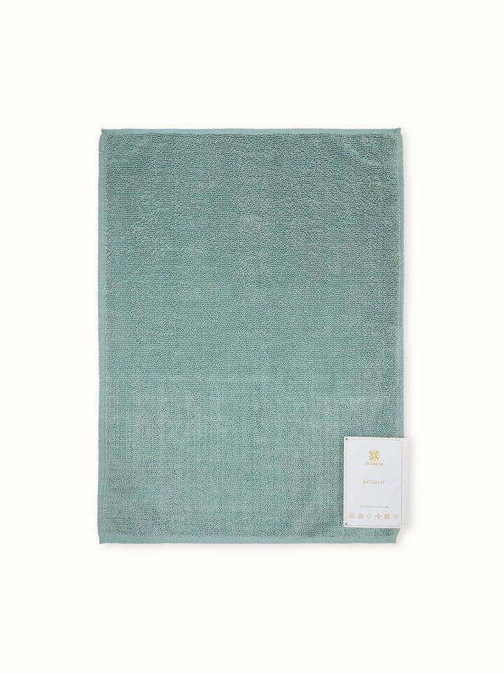 Back side view of Nityam light green cotton bath mat