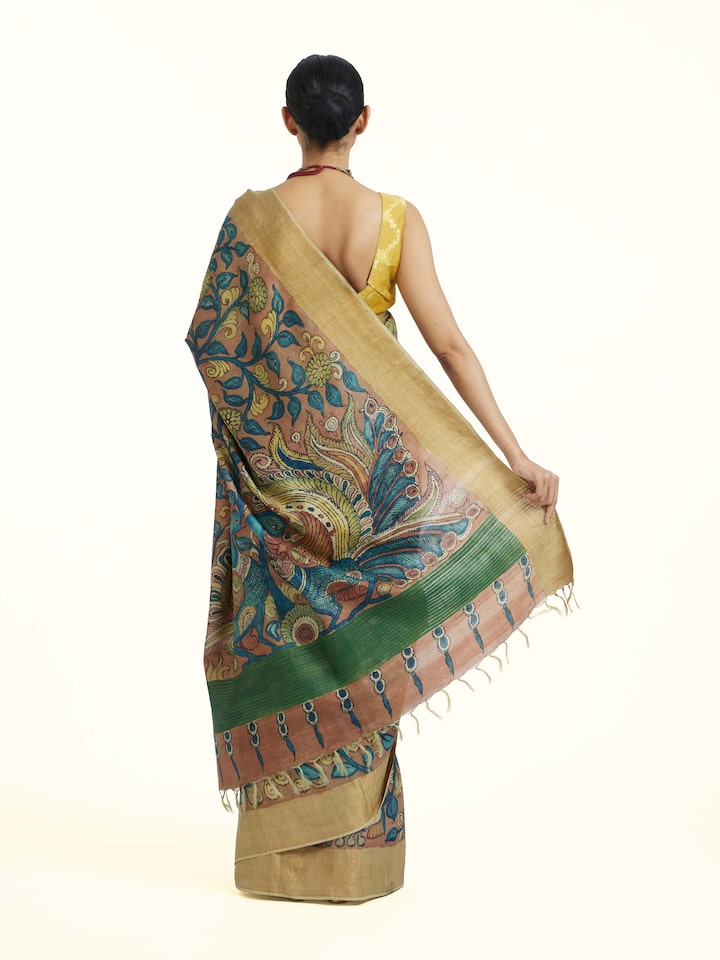 Back view of Beige Kalamkari Tussar Silk Saree emphasizing the overall design and fine details