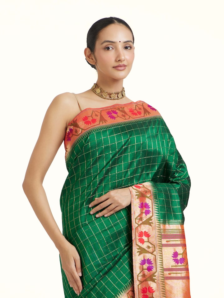 Angled view of the Green Mulberry Silk Paithani Handloom Saree