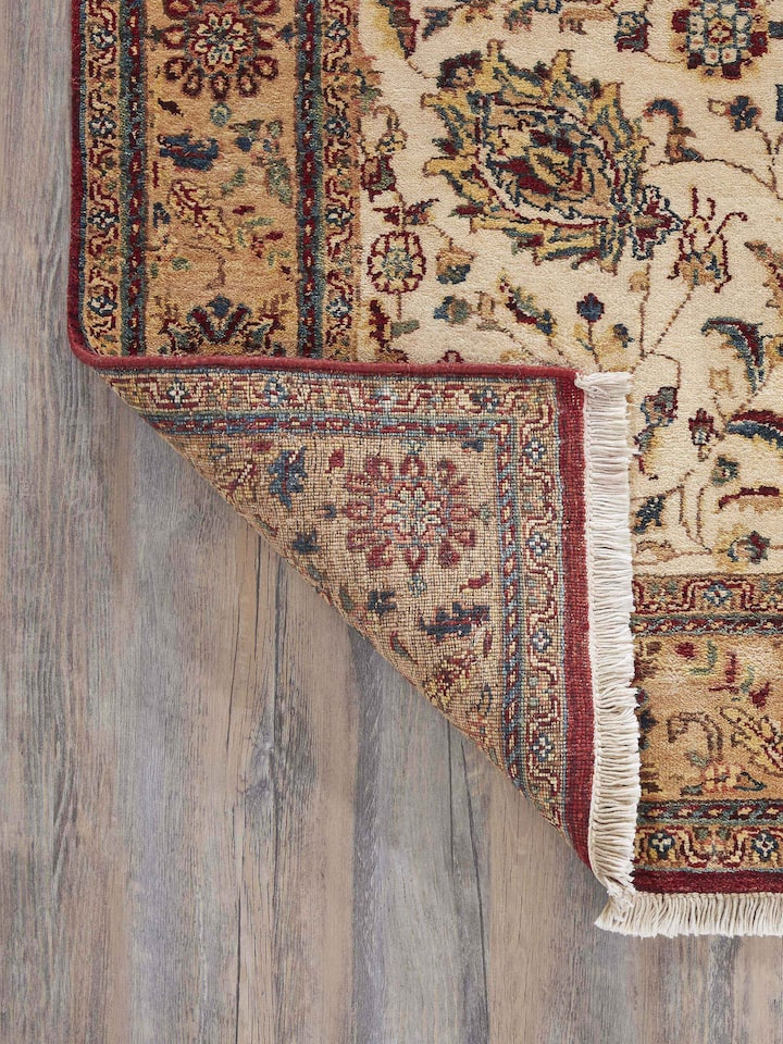 Back side of Ziegler Jaipur traditional gold wool carpet with hand-knot finish