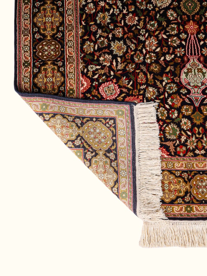 Side-angle view of the Traditional Persian Black Ochre Ardebil Kashmir Silk Hand-Knotted Carpet