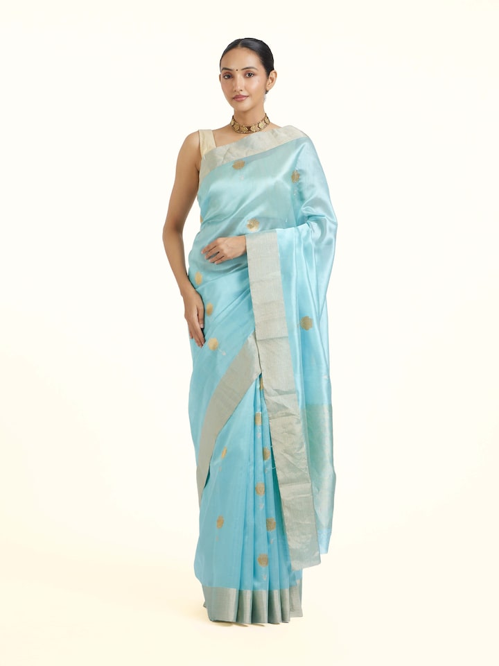 front view of teal chanderi pattu saree with elegant design