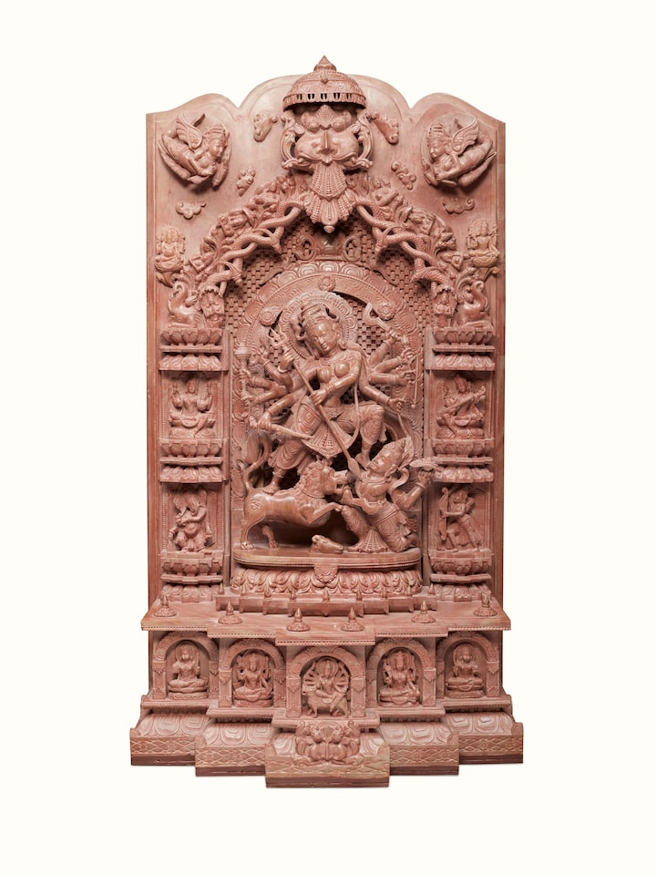Front view of Stone Devi Idol showcasing its carved details and devotional significance.