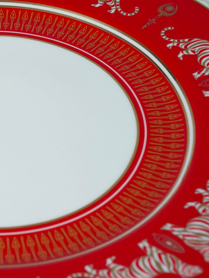 Detail view of Ceramic Charger Plate With Hand-Applied Gold-Accent Motifs highlighting the handcrafted detailing and finish, from a different angle