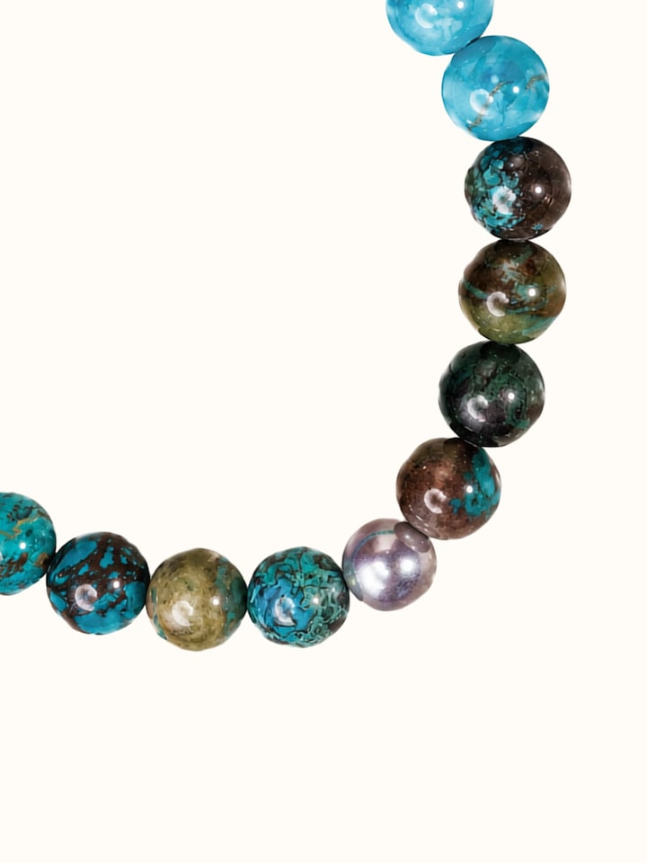 Detail view of Gemstone Silver Turquoise, Amazonite and Chrysocolla Bead Silver Bracelet highlighting the stone setting and metalwork detail