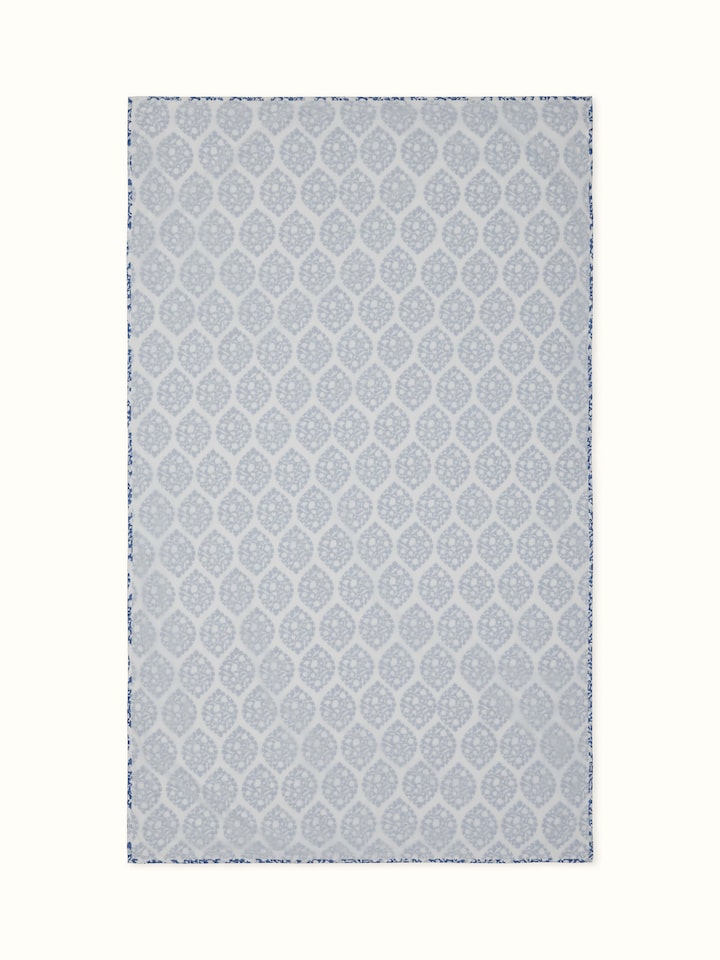 Front view of single cotton dohar featuring blue ogee motifs in Sanganeri hand block print.