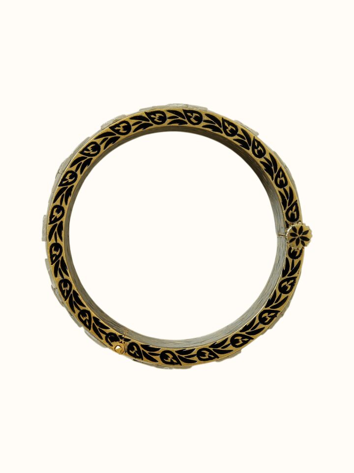 close-up view of meenakari nathdwara silver gold plated bangle texture
