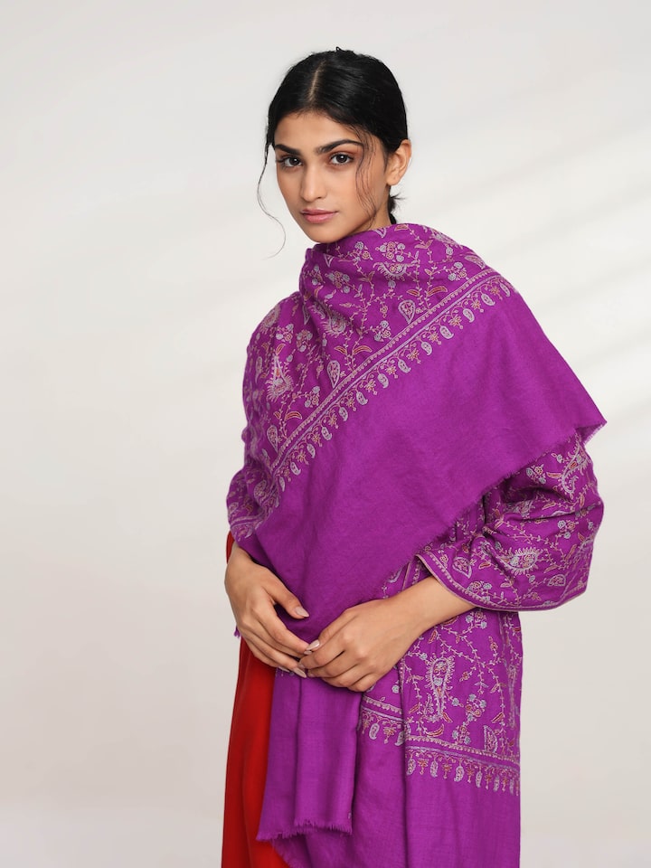 Angled view of purple jalidar sozni embroidered shawl highlighting jalidar pattern
