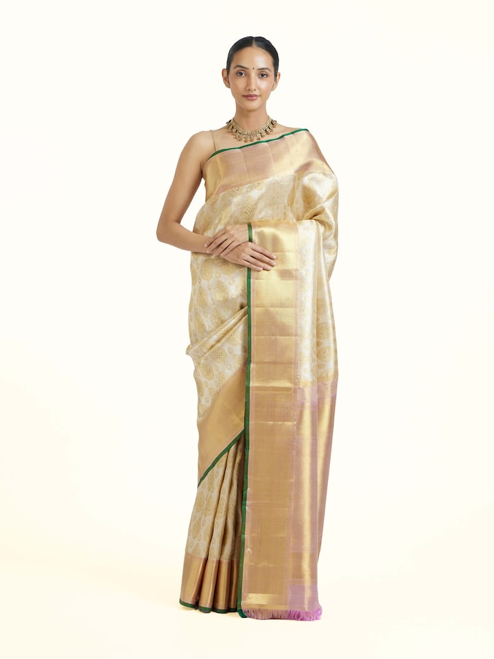 Front view of Gold Kancheepuram Silk Zari Saree showcasing its traditional craftsmanship and design