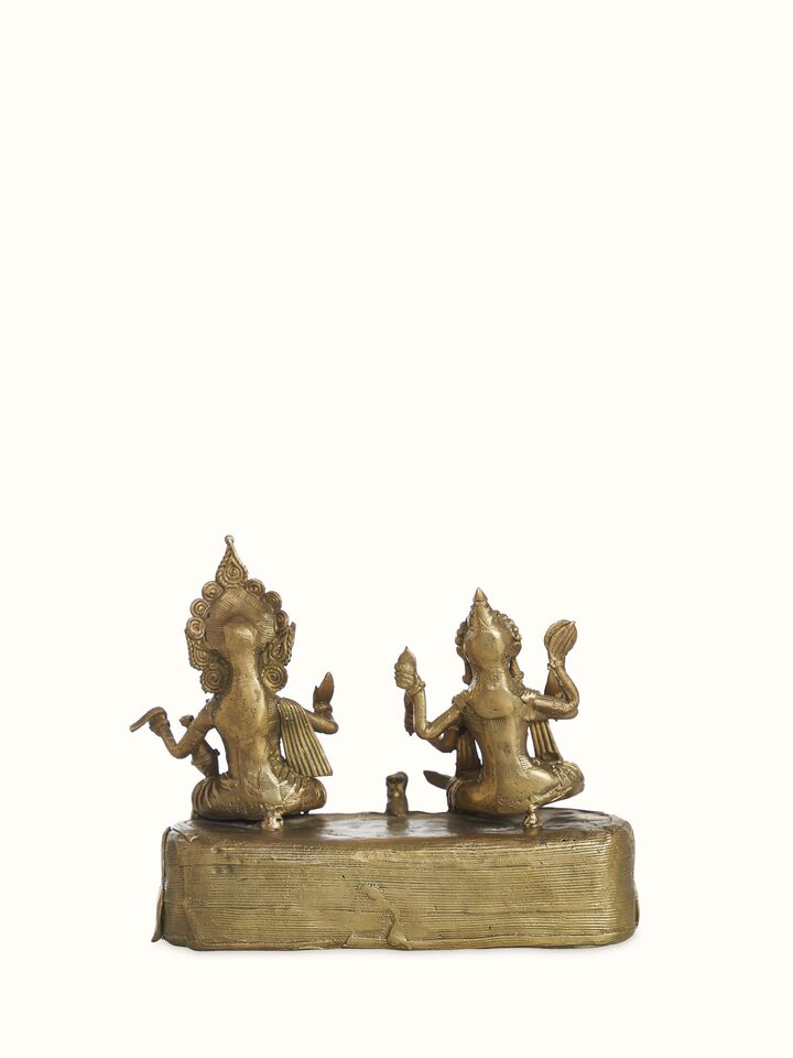 Back view of Dhokra brass Shiva Parvati idol showing sculpted form