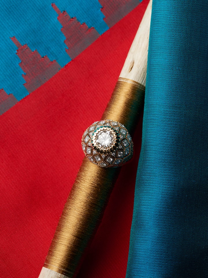 front view of open setting 14 karat gold ring with minimalist design