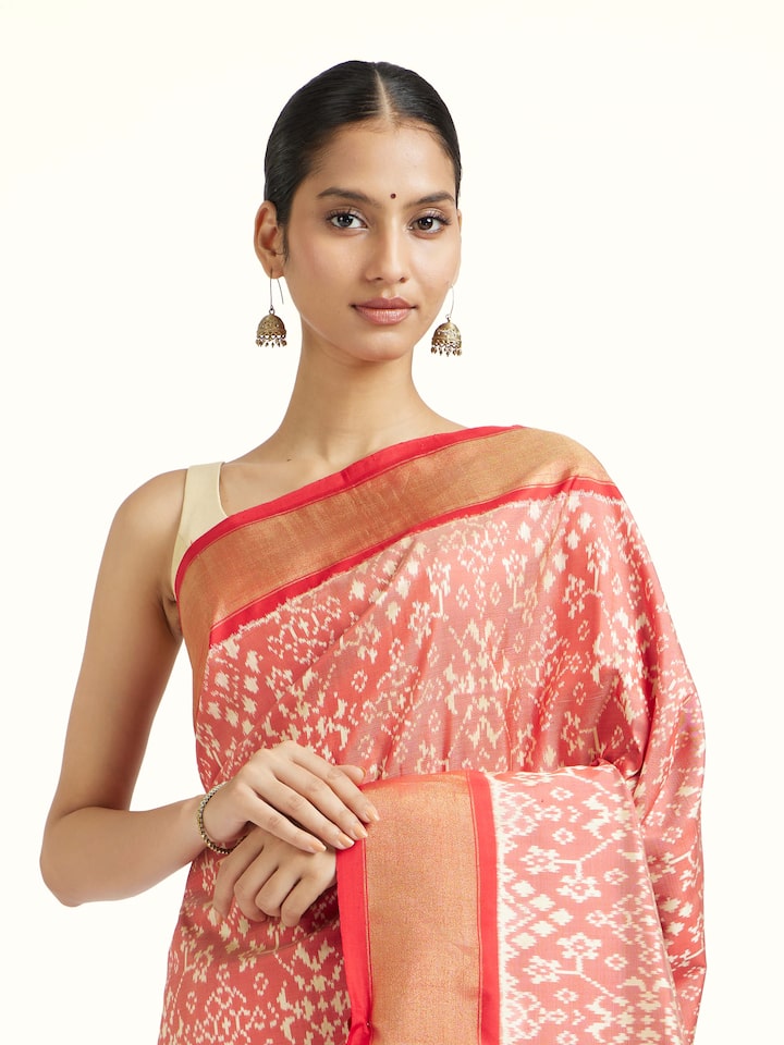 Angled view of the Red Mulberry Silk Pochampally Ikat Handloom Saree