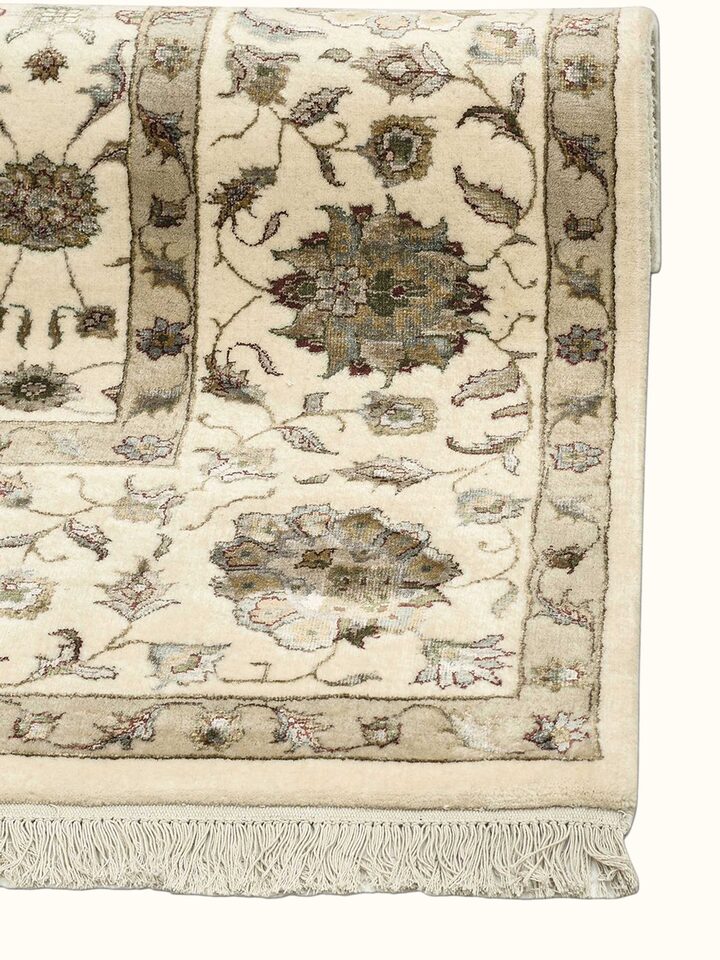 Close-up view of Traditional Kashan Ivory Beige Bhadohi Wool-Viscose Hand Knotted Rug highlighting the hand-knotted weave and motif detail, from a...