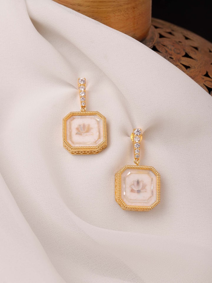 lifestyle view of parchinkari silver drop earrings