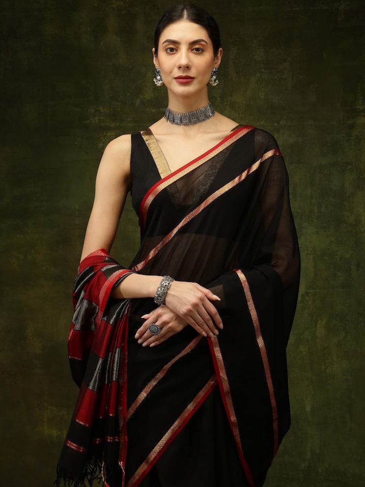 Detail view of black cotton silk Maheshwari saree with fabric texture and weave