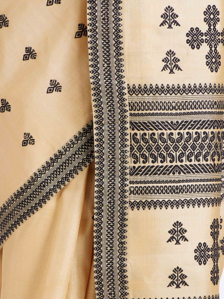 Detailed view of Beige Tussar Silk Saree focusing on the fine craftsmanship and texture