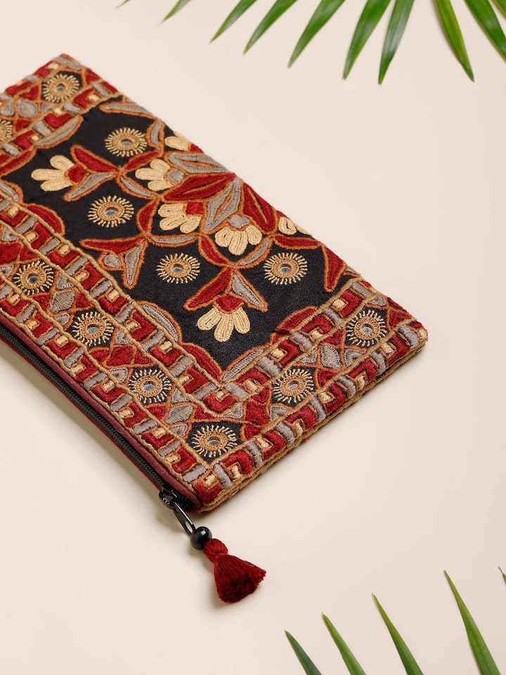 Side view of Kutchi Embroidered Clutch Bag focusing on the intricate patterns and craftsmanship
