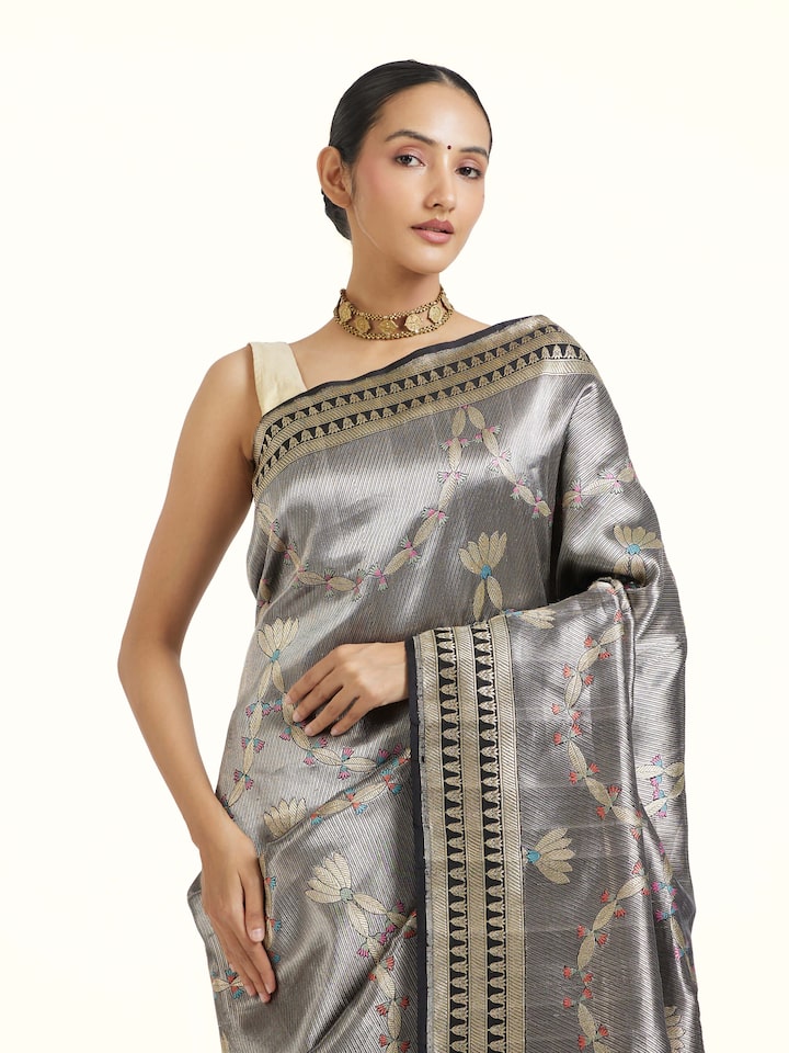 Angled view of Black Banarasi Brocade Silk Saree revealing the depth of its color and intricate pattern