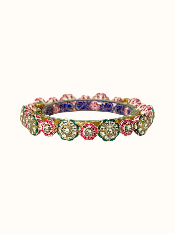 close-up view of meenakari nathdwara silver gold plated bangle texture