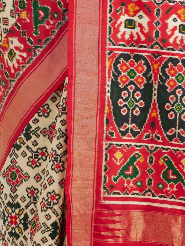 detail view of cream pochampally double ikat silk saree pattern