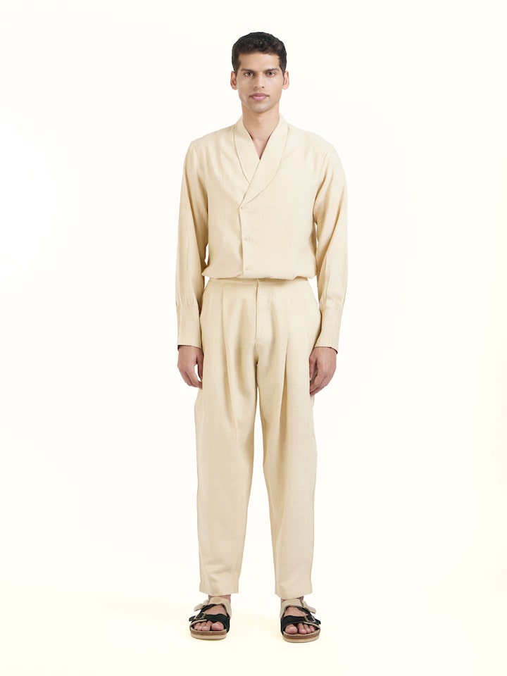 Front view of off-white silk handloom straight pants with clean silhouette