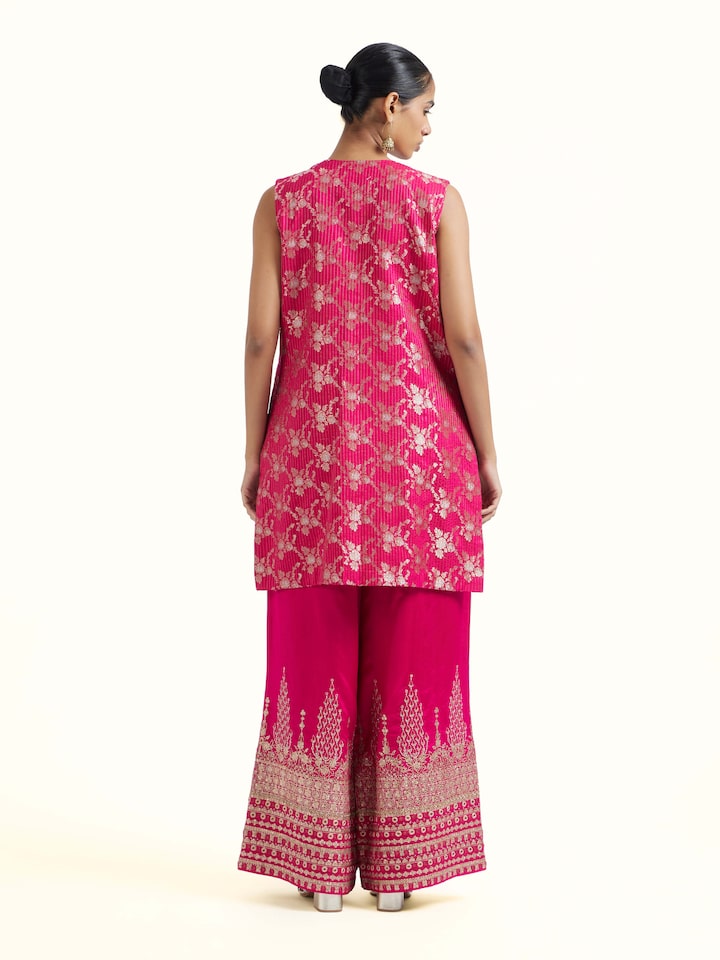 Back view of pink silk hand embroidery kurta set with neat finishing