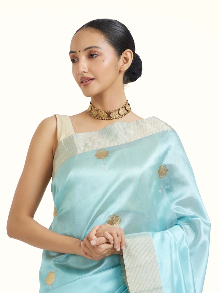 angled view of teal chanderi pattu saree