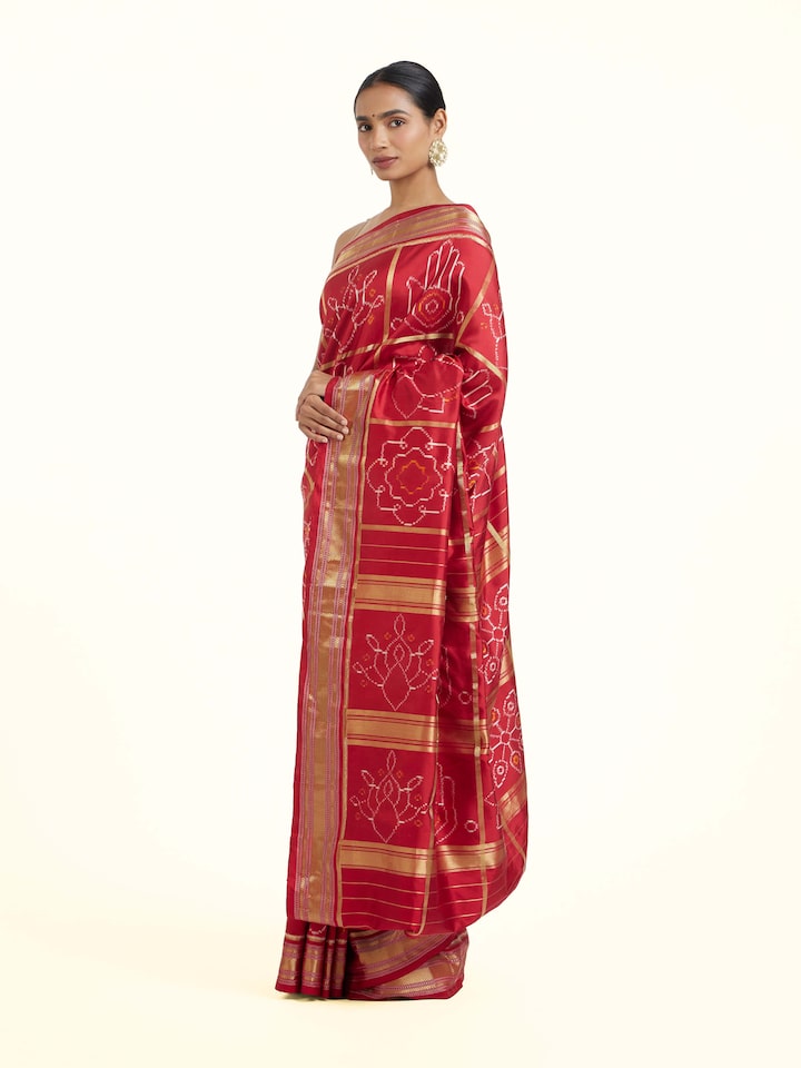 Side view of Red Pochampally Single Ikat Saree highlighting the detailed craftsmanship and elegant silhouette