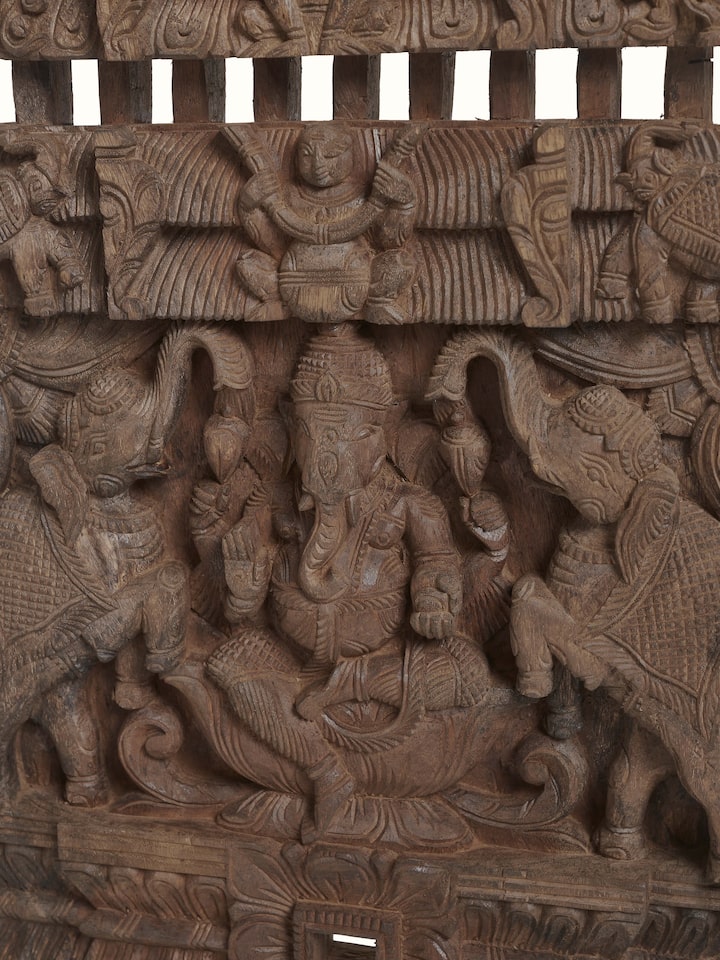 Angled view of the Wood Carved Ganesha Wall Panel