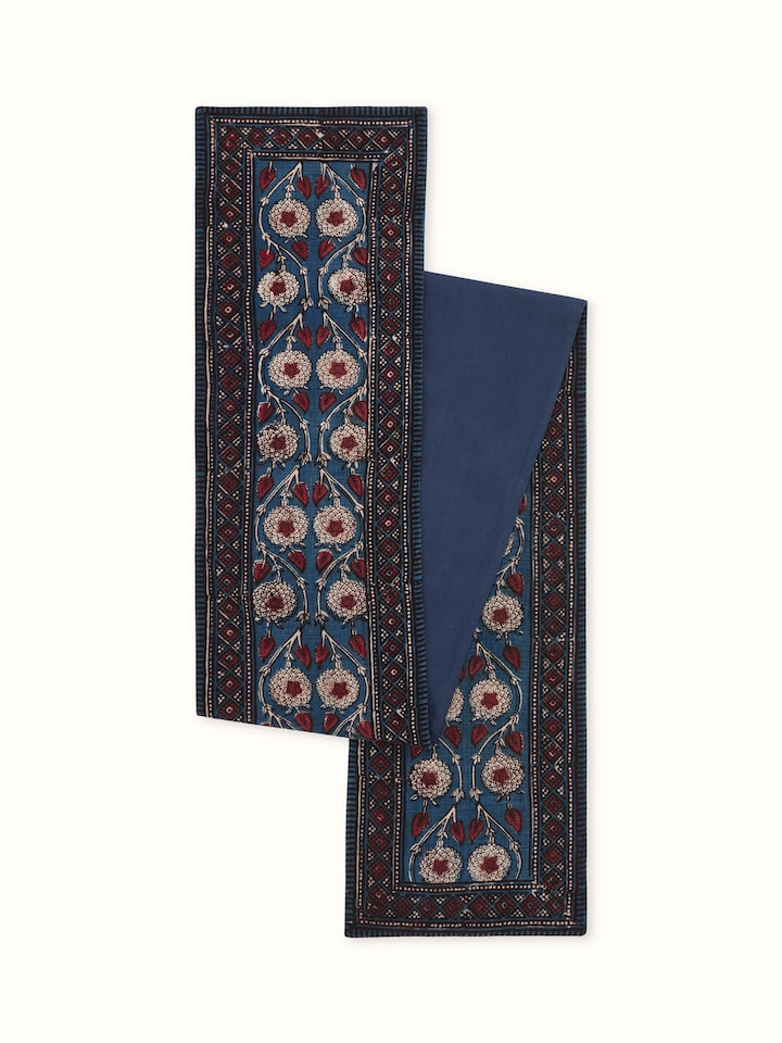 Front view of Puspita Indigo Cotton Dabu Hand Block Printed Table Runner folded to show the floral block print