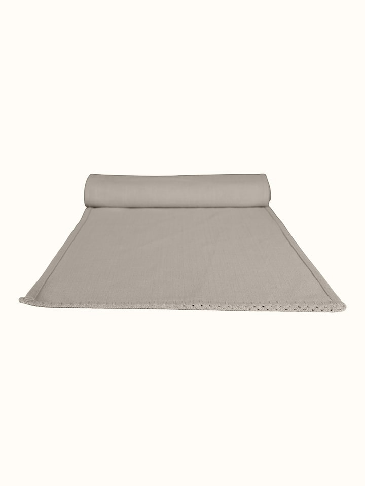 Close-up view of Nityam Beige Cotton Slub Crochet Table Runner highlighting the weave and stitch detail