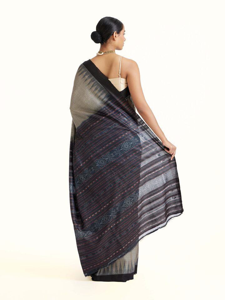Back view of Green Tussar Silk Odisha Ikat Saree emphasizing the overall design and fine details