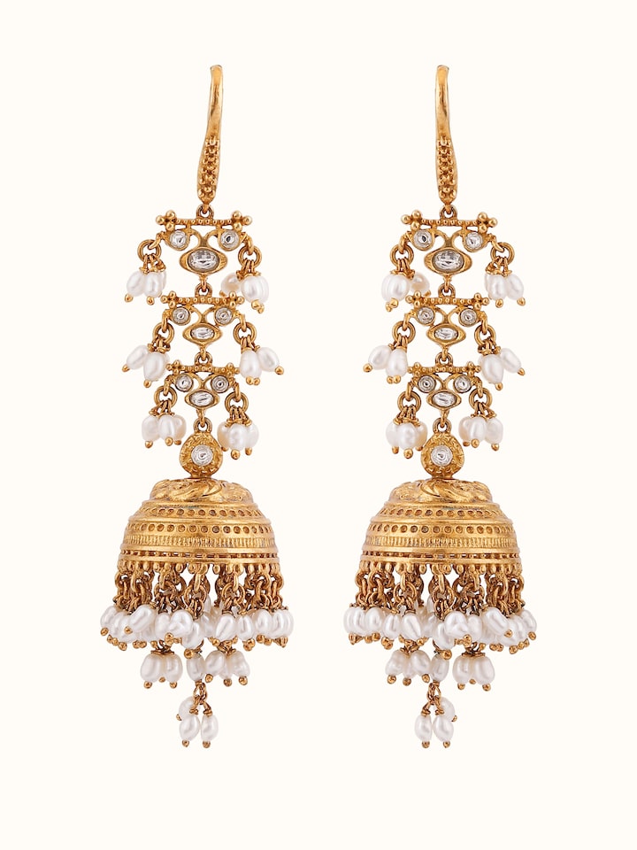 Front view of Guttapusalu silver jhumkas adorned with pearl clusters and temple-style design.
