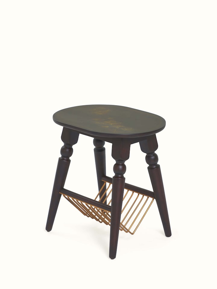 Angled view of Swadesh Sheesham Wood & Brass Tarkashi Magazine Rack with Metal Shelf highlighting the brass inlay and functional structure
