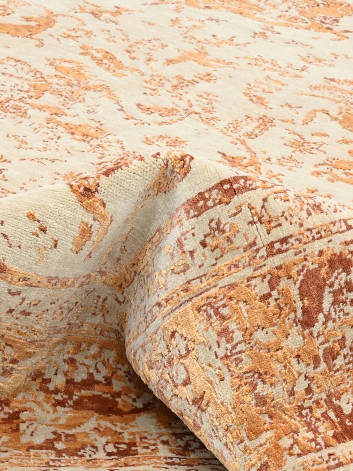 Detail view of Transitional Persian Ivory Rust Shikargah Bhadohi Wool & Bamboo Silk Hand Knotted Rug highlighting the intricate pattern and pile te...
