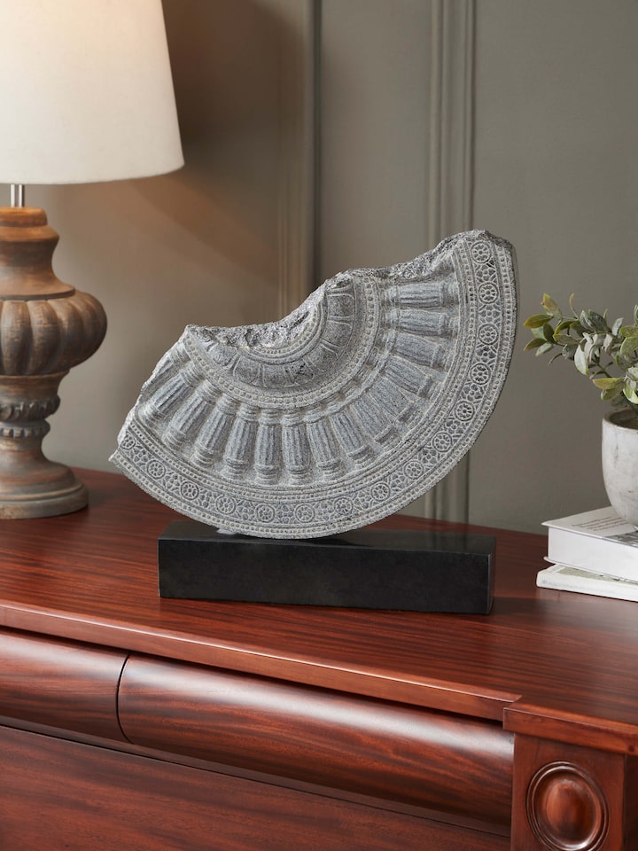 Left-side view of the Stone Carved Rath Chakra Sculpture