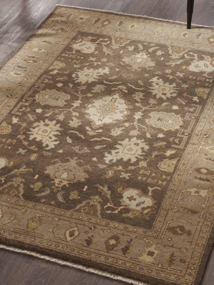 Lifestyle interior view highlighting brown Oushak-style Jaipur hand-knotted wool rug.