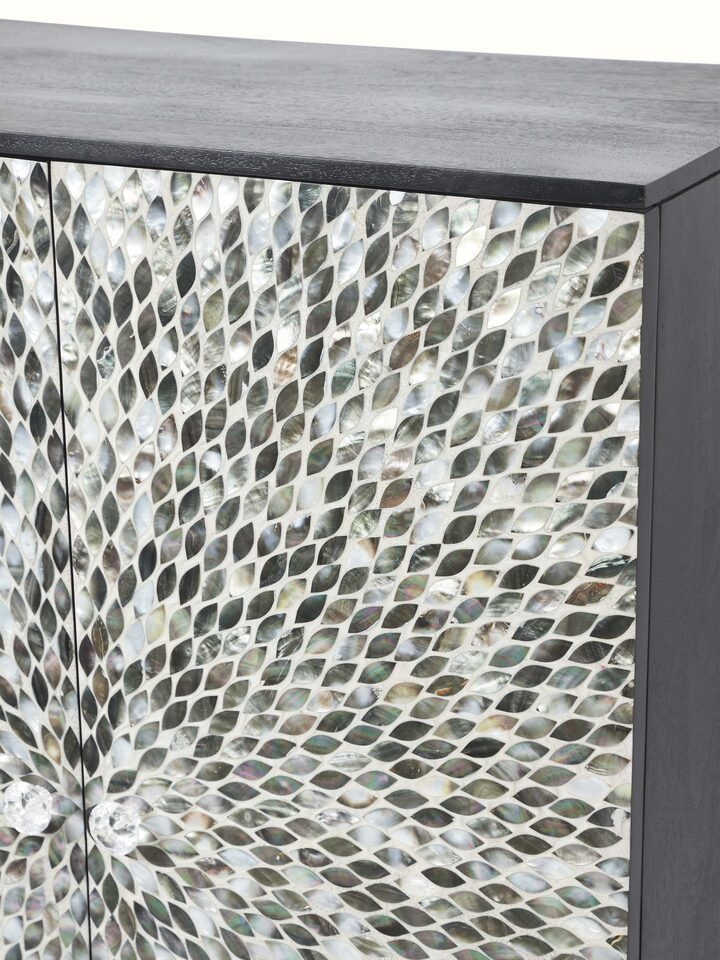 View of the interior of the mango wood bar cabinet with mother-of-pearl inlay, showcasing the storage compartments and design