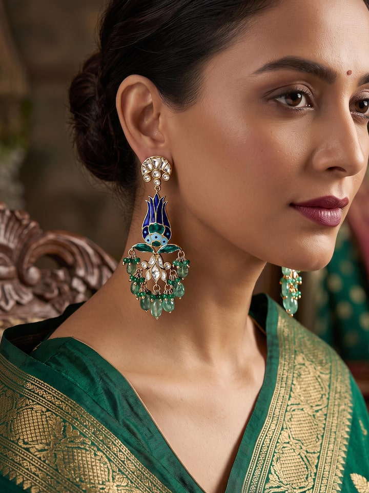 Styled view of Silver Smithing Drop Earrings worn on the ear, showing how it looks styled