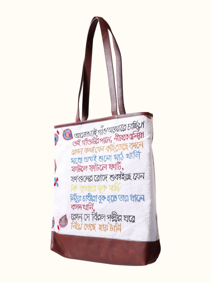 Close-up of Kantha Embroidered Canvas Tote Bag highlighting the printed text detail