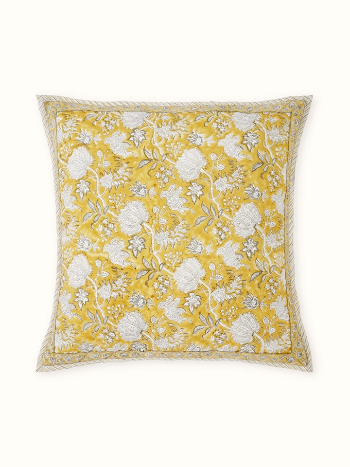 Second front view showing detailed floral print on yellow cotton euro shams.
