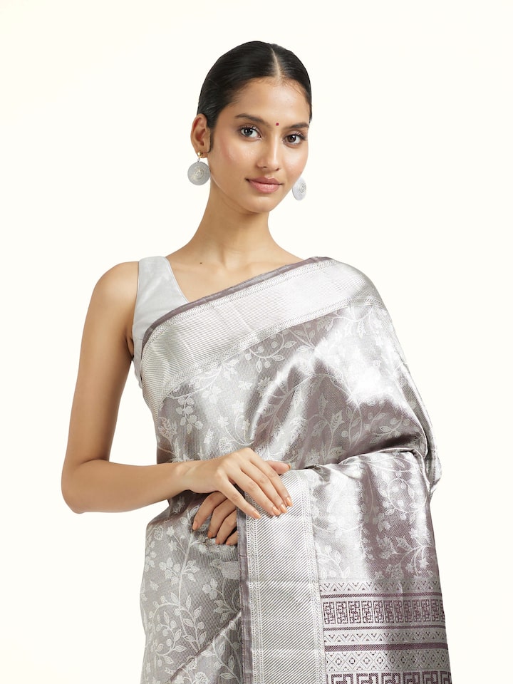Angled view of the Brown Silk Kancheepuram Handloom Real Zari Saree
