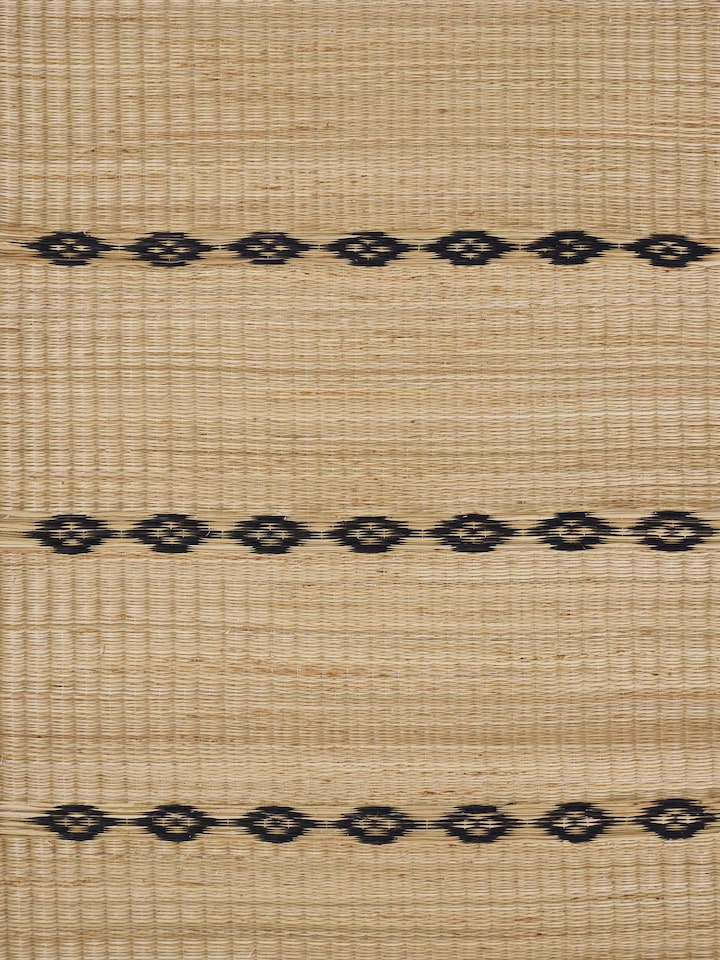 Close-up showing handwoven texture and stripe detail on Prakriti natural Madurkathi placemats