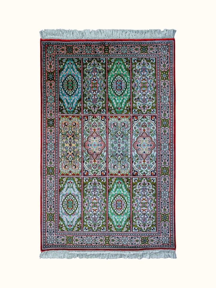 Front view of the Swadesh Traditional Persian Green Gum Kashmir Silk Hand-Knotted Carpet