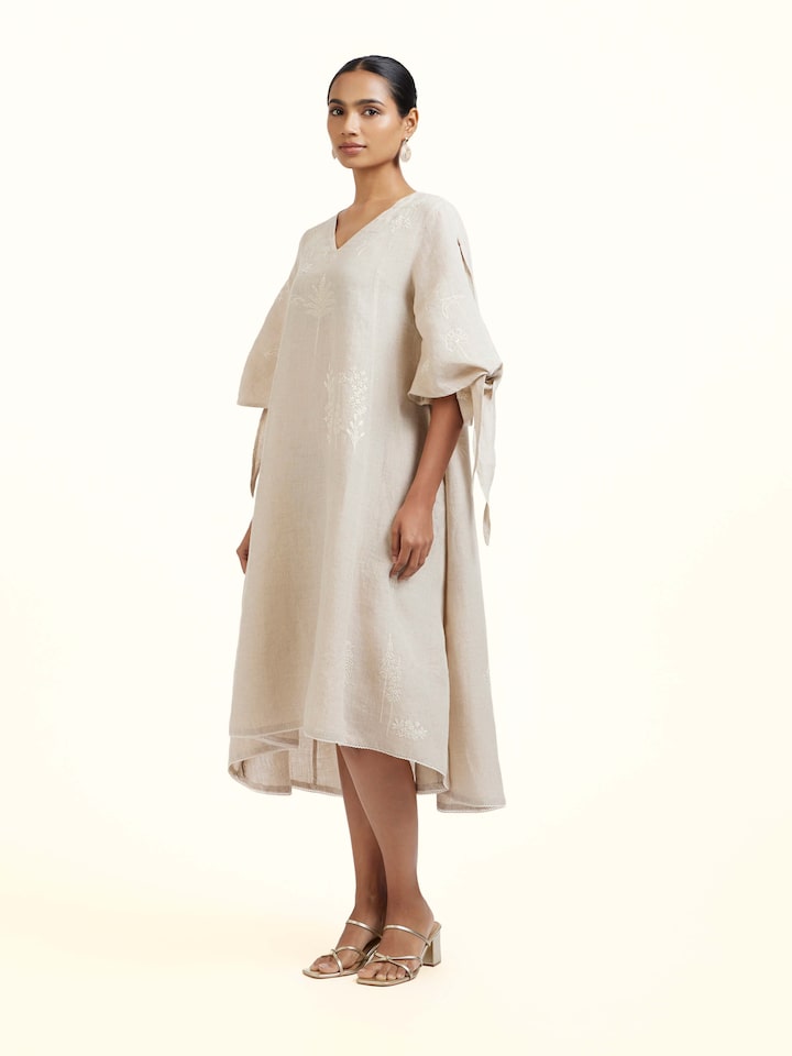 Side view of Natural Linen Chikankari Dress showing the side fit and silhouette