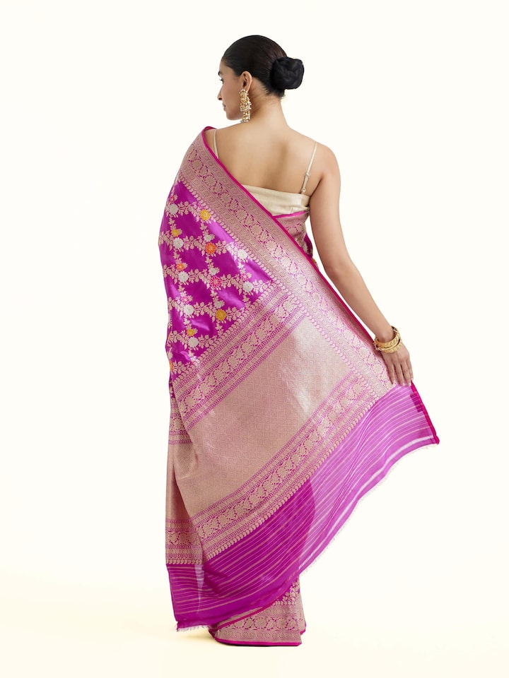 Back view of magenta Banarasi silk kadwa jaal saree displaying elaborate pallu design