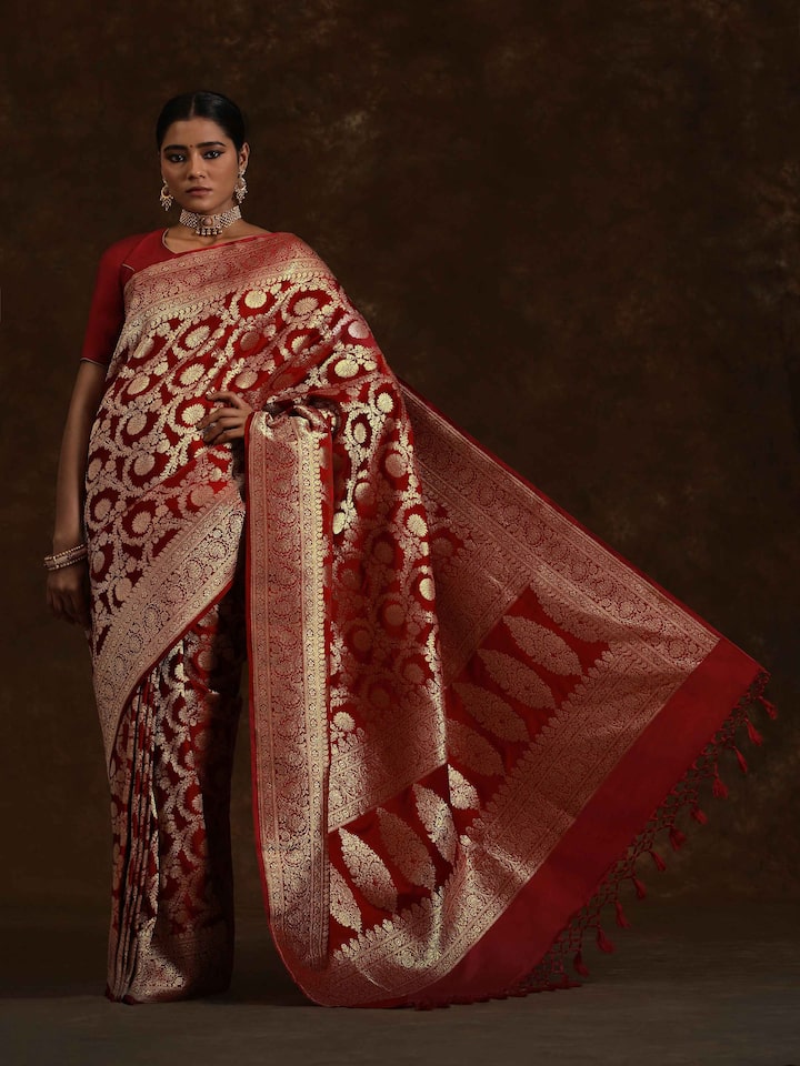 Lifestyle view of Ruby Wine Mulberry Satin Silk Banarasi Saree draped elegantly showing lustrous silk and zari
