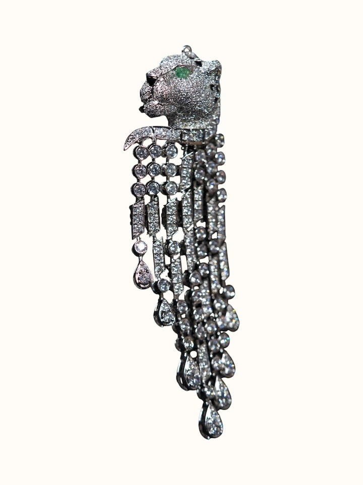 angled view of silver smithing brooch pin
